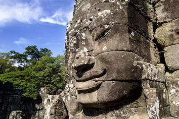Face of giant, Stone head at Bayon Castle in Angkor Thom ,SIEM REAP,CAMBODIA.