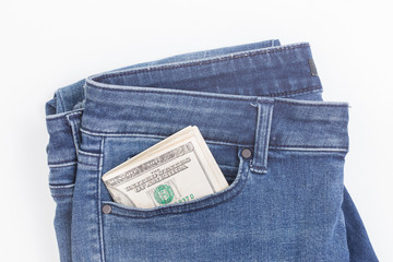 American dollar banknote in a pocket of blue jean