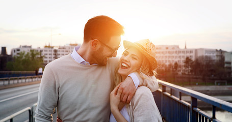 Romantic couple dating in sunset - obrazy, fototapety, plakaty