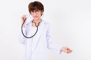 Young Asia Doctor with stethoscope. Isolated on white background. Studio lighting. Concept for healthy