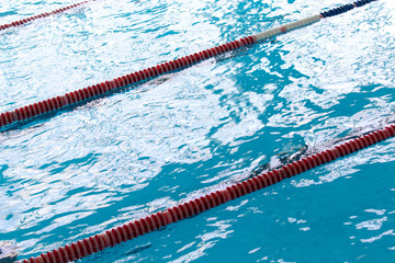 water in the sports pool as a background