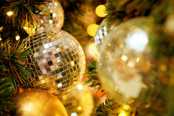 joy to decorative with mirror ball or Christmas ball to decorative for Christmas festival with bokeh background. Have some space for write wording