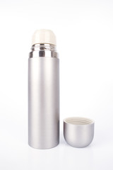 Metal thermos flask isolated on white background