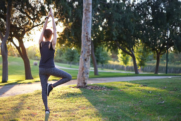 woman workout in park .relax and exercise.