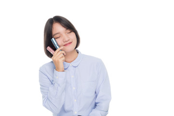 portrait of a beautiful asian businesswoman with perfume. Isolated on white background with copy space