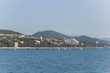 view of the coast of Sochi,Russia. the Black sea coast with sailing boats.