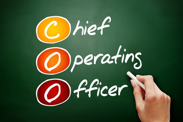 COO - Chief Operating Officer, acronym business concept on blackboard