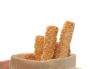 hand holding bread stick