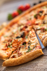 Pizza On A Wooden Table
