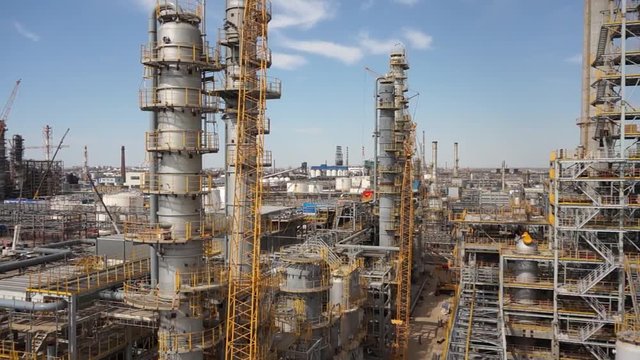Aerial of oil refinery plant under construction 50p