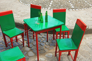 Colorful leather back coffee-house chairs and tables in the colonial town of El Jardin Colombia, South America