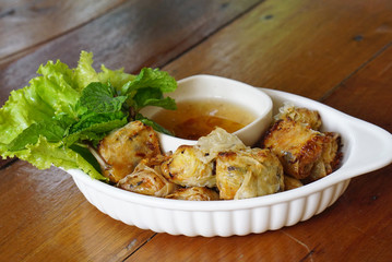 deep fried spring rolls serving with plum sauce