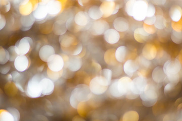 gold abstract background with bokeh defocused lights