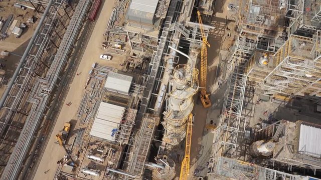 Aerial of oil refinery plant under construction 50p