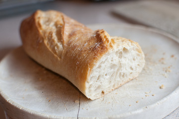 baguette on wooden plate