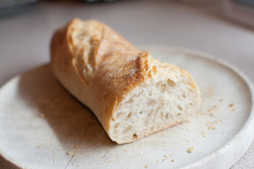 baguette on wooden plate