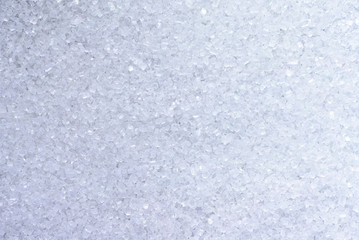 Fototapeta na wymiar White sugar crystals closeup as texture.