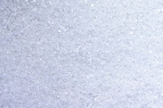 White Sugar Crystals Closeup As Texture.