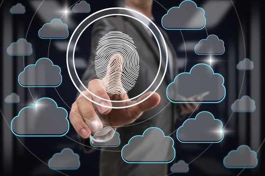 Businessman Fingerprint scan by pressing for unlock all cloud technology data over blurred data center server room background, Business Technology sceurity Concept.