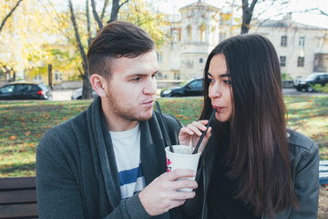 Young couple walking in a park