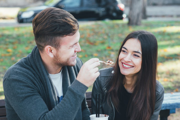 Young couple walking in a park