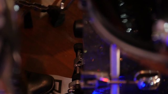 closeup Jazz musician playing bass drum, pressing his foot on pedal, Live concert. Slow motion