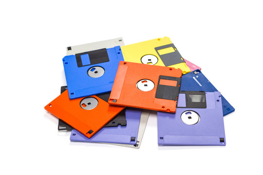 A floppy disk , also called a floppy , diskette , or just disk were a ubiquitous form of data storage and exchange from the mid-1970s into the mid-2000s. isolated on white background