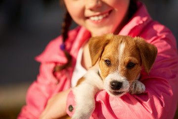 Girl with a dog in park