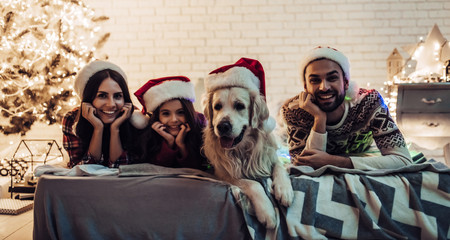 Family with dog on New Year's Eve