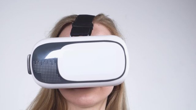 Extreme Close-up of Young Girl with VR Headset
