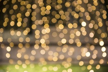 Christmas lights with blur bokeh. Night lights on street. Bokeh light abstract background..