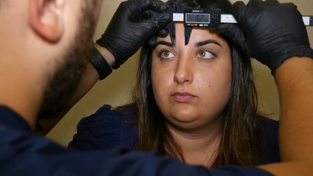 Measure eyebrow parameters before correction in clinic