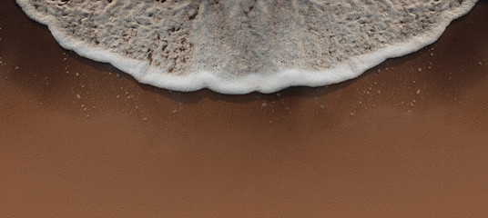 Wave of blue sea on sandy beach. Natural panorama Background.