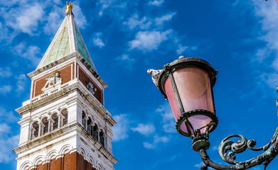 Fototapeta na wymiar The Mark Tower in Venice is the bell tower of St. Mark's Basilica. 