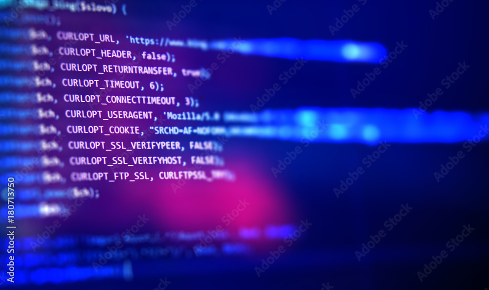 Wall mural screen with software developer code.