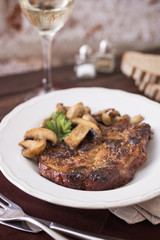 Pork chop with mushrooms