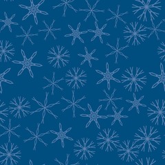Seamless pattern with abstract snowflakes on blue background. Chaotic, random, scattered winter motives. Vector illustration.
