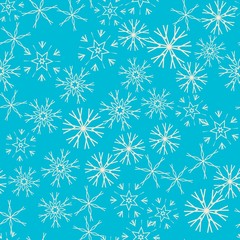 Seamless pattern with abstract snowflakes on blue background. Chaotic, random, scattered winter motives. Vector illustration.