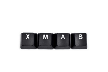 Keyboard Xmas stock images. Xmas inscription. Computer keyboard Xmas button. Keyboard buttons on a white background