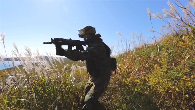 Search and destroy. Soldier on duty. Soldier with automatic rifle.