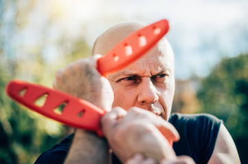 Knife vs knife. Kapap instructor demonstrates fighting and disarming technique