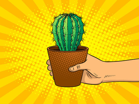Hand with cactus pop art vector illustration