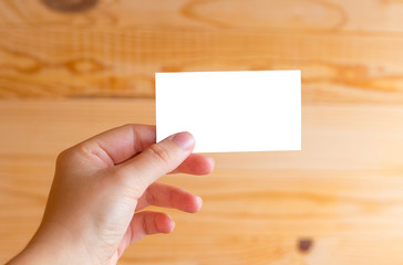 Obraz premium Business card on a wooden background