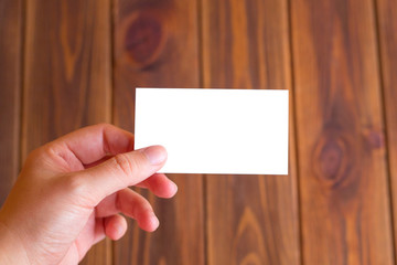 Obraz premium Business card on a wooden background