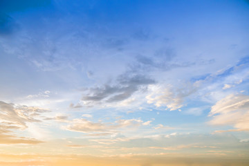 Dramatic sunset and sunrise sky with beautiful and colorful nice soft cloud background concept.