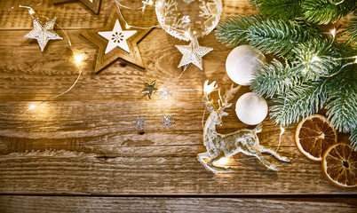 Christmas card with branch fir snow and glass ball on old wooden