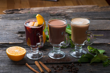  hot autumn drinks mulled wine on a wooden background