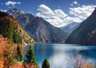 Amazing view of the Long Lake among snow-capped mountains