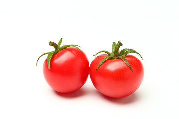 small tomatoes isolated on white background