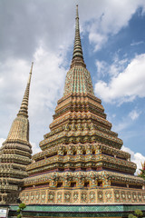 Fototapeta premium Pagoda is in Wat Pho that was named as the temple of the pagoda or chedi that are decorated with yellow glaze or glazed tiles or dark blue. 